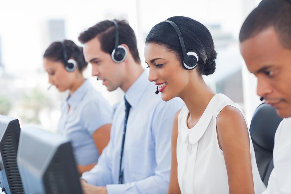 Smiling call center employees